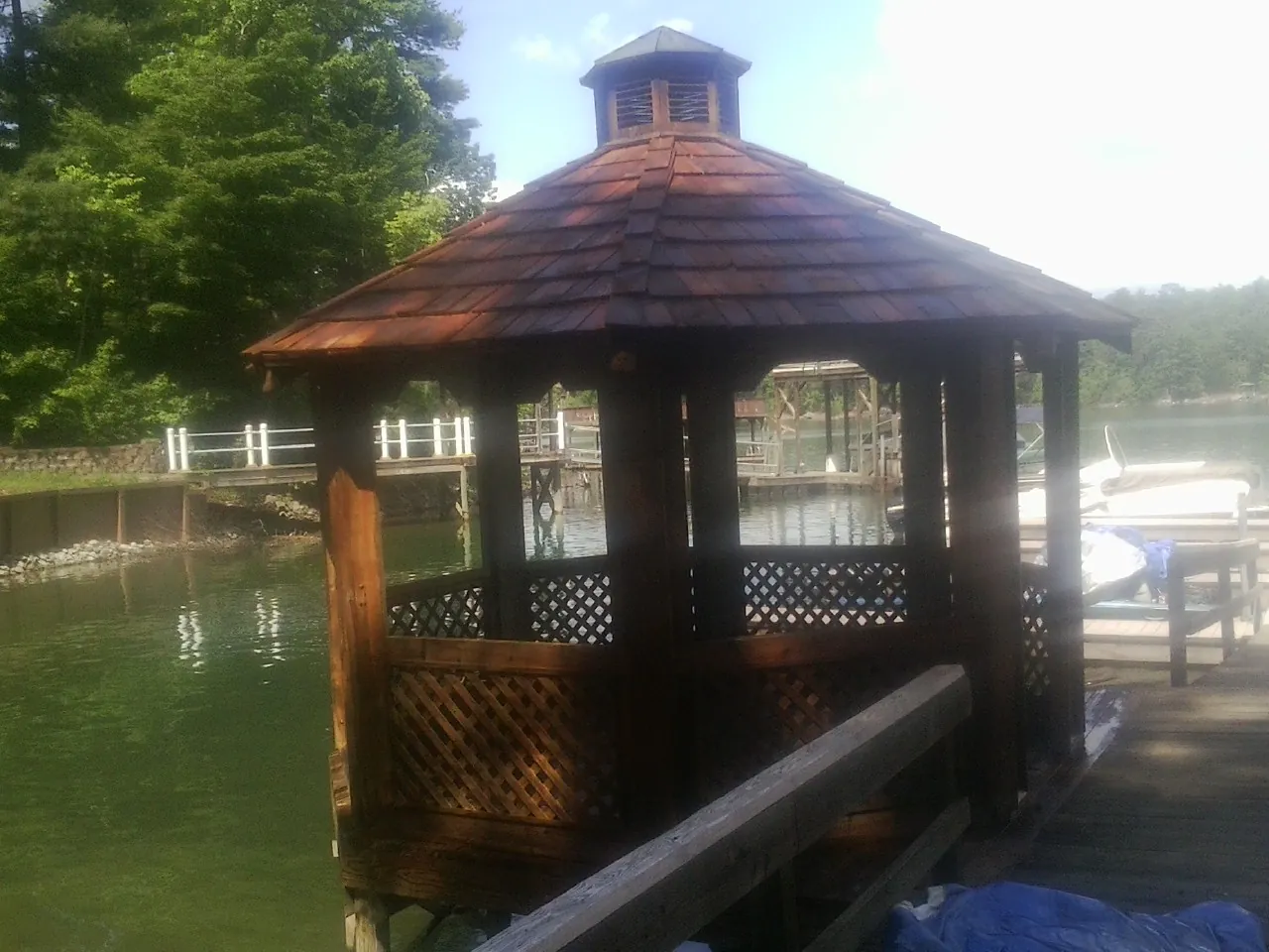 Cedar shake gazebo roof rebuilt on a lake dock in Georgetown